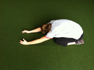 One of my favorite recovery moves....child's pose with attention on the lat stretch!