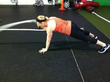 If you are looking for a serious core move, try a plank with one arm waves!