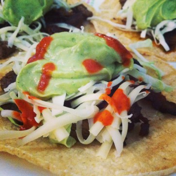 bacon ribeye tacos with avocado salsa